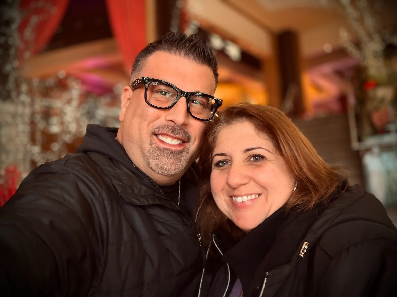 Nicole Mendys and Jay Urbaniak bundled up together
