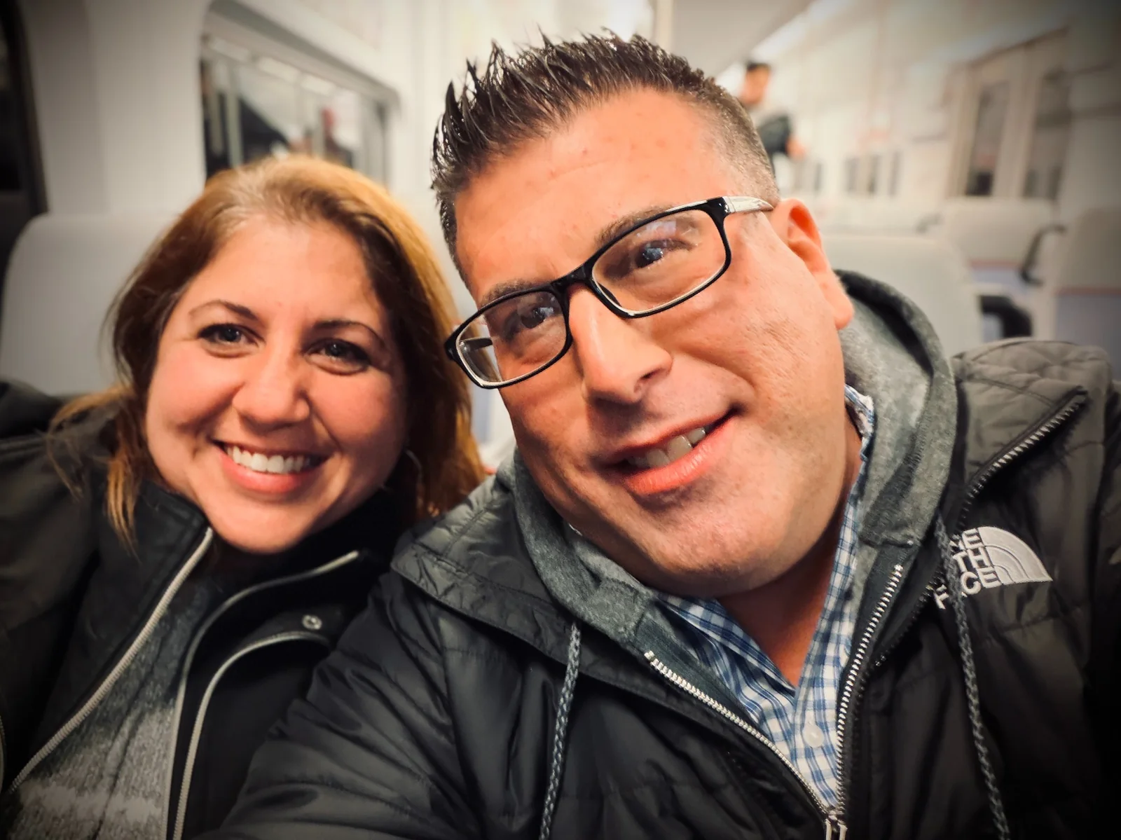 Nicole Mendys and Jay Urbaniak smiling together